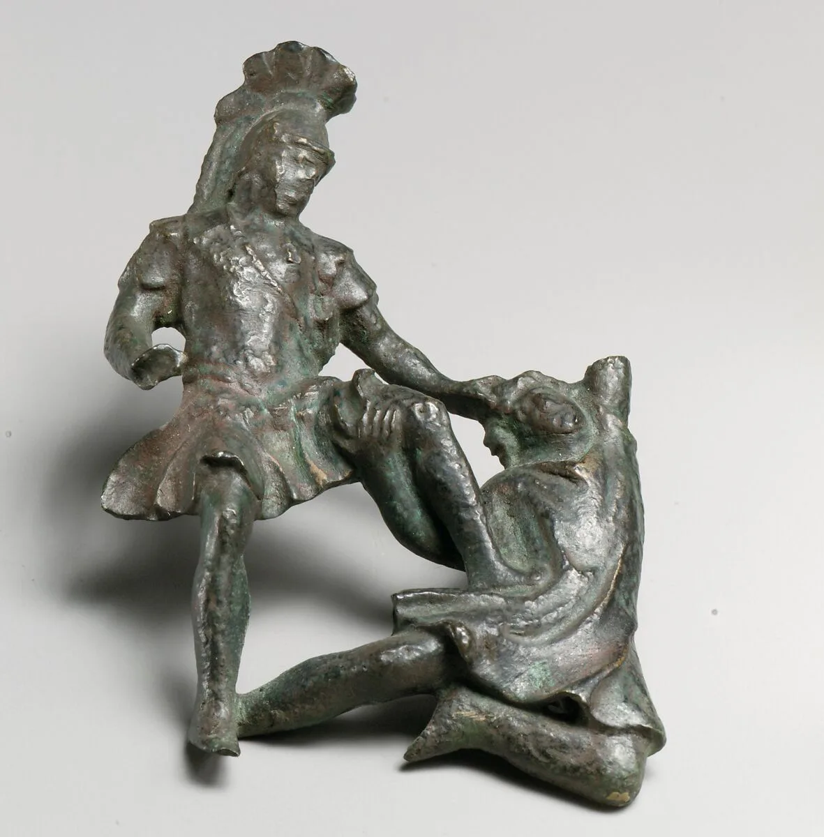 Bronze relief of a Roman soldier and a barbarian — Unknown