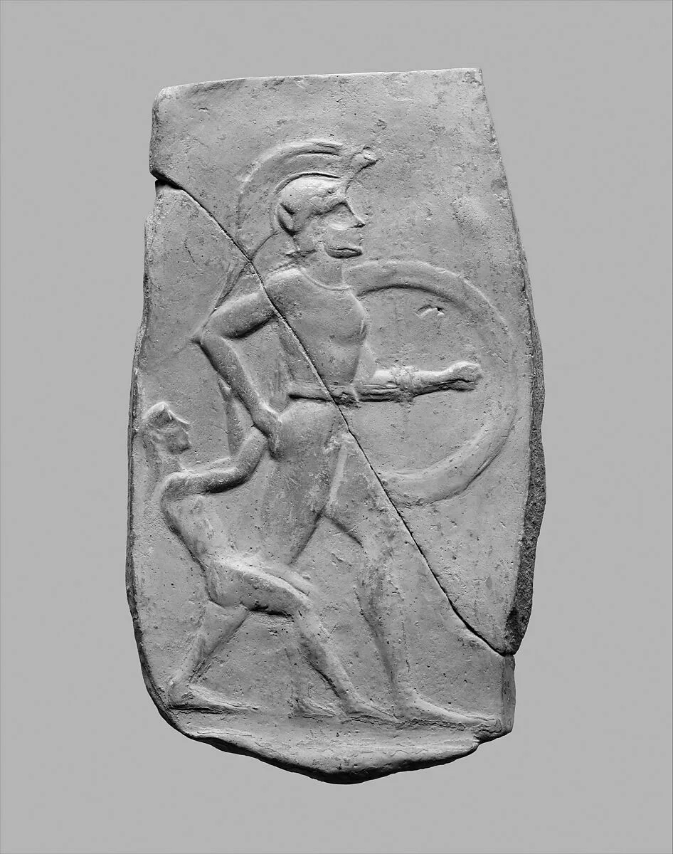 Terracotta relief of a warrior dragging a captive — Unknown