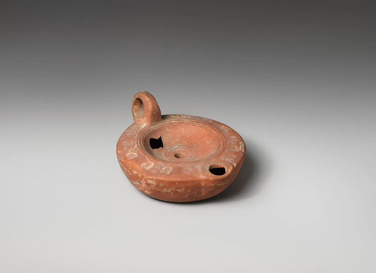 Terracotta oil lamp — Unknown