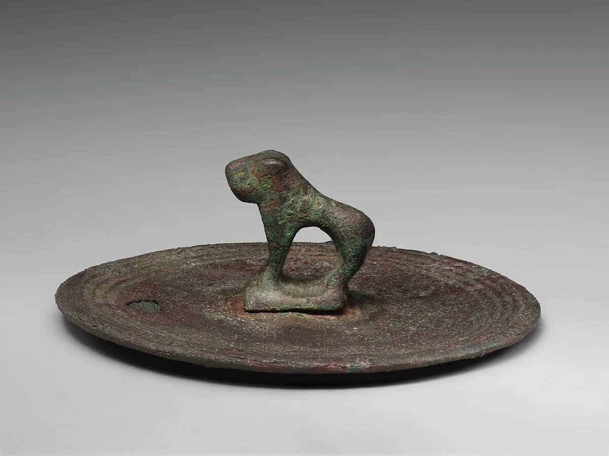 Mirror or lid with handle in the form of a lion — Unknown