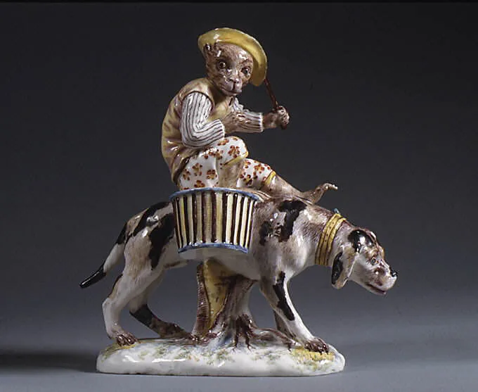 Monkey riding a dog — Mennecy