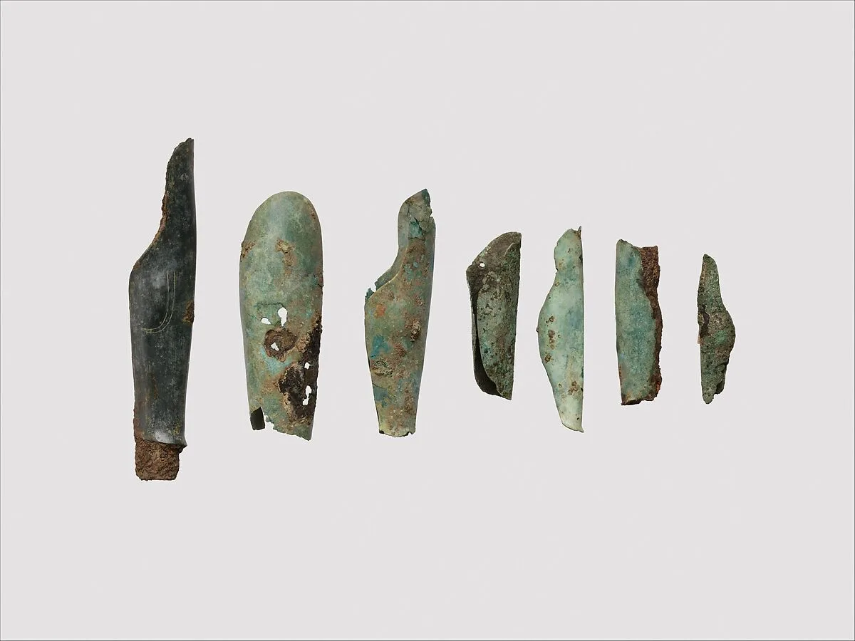 Miniature bronze greave — Unknown
