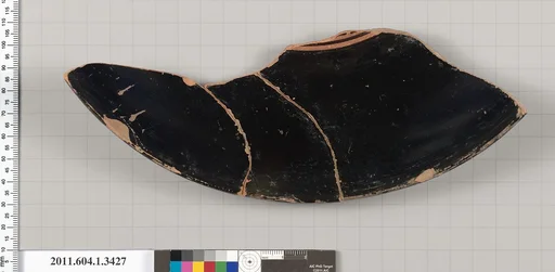 Terracotta fragment of a kylix (drinking cup)