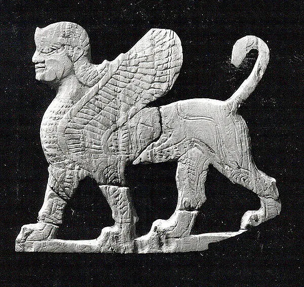 Plaque with a striding sphinx — Unknown