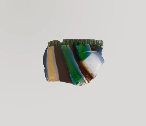 Glass striped mosaic bowl fragment