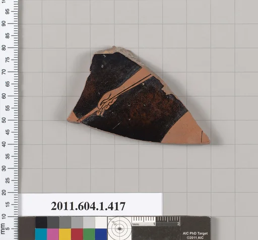 Terracotta fragment of a kylix (drinking cup)