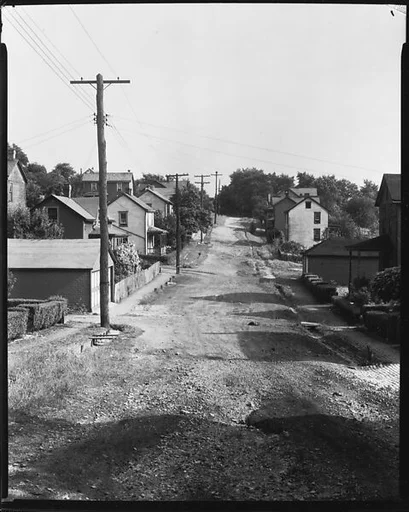 [Houses in Rows Along Dirt Road, Mt. Pleasant, Pennsylvania]