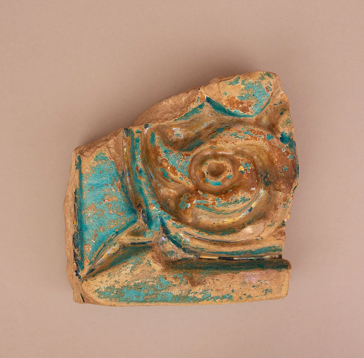 Fragment of a Carved or Molded and Glazed Tile — Unknown