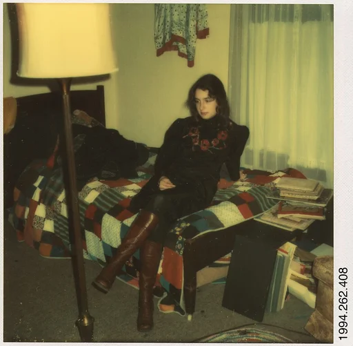 [Carla Steiger Seated on Her Bed, Oberlin, Ohio]