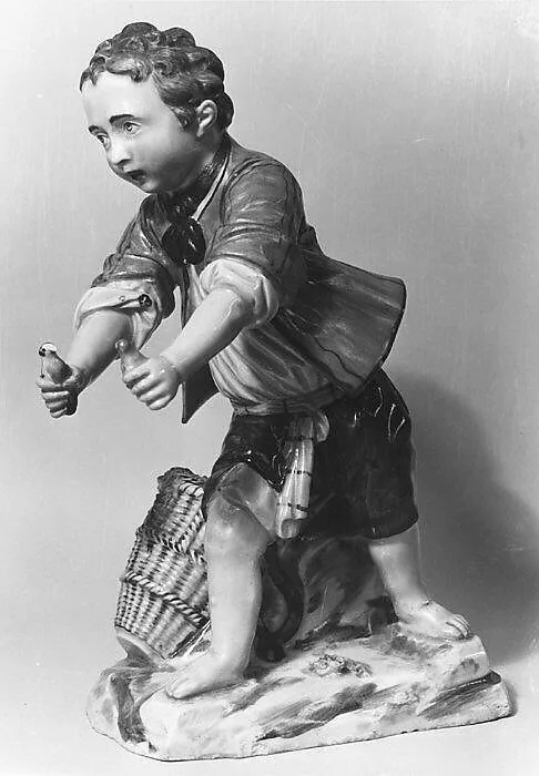 Boy holding birds — Ottweiler Pottery and Porcelain Manufactory
