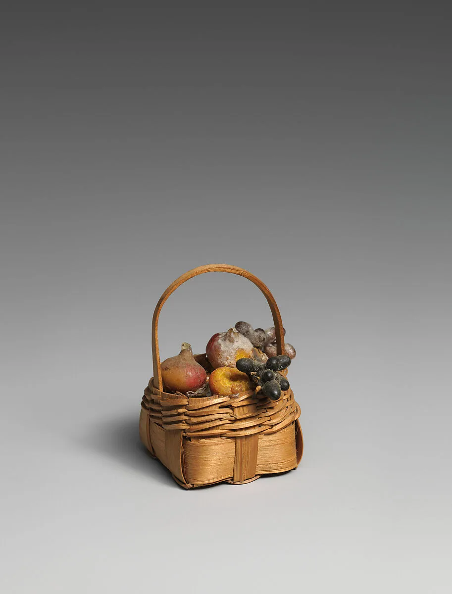 Handled basket with fruit — Unknown