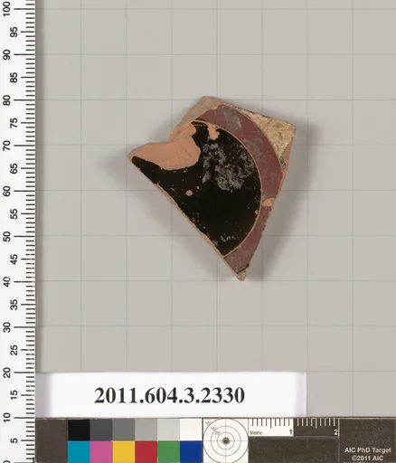 Terracotta fragment of a kylix: eye-cup (drinking cup)