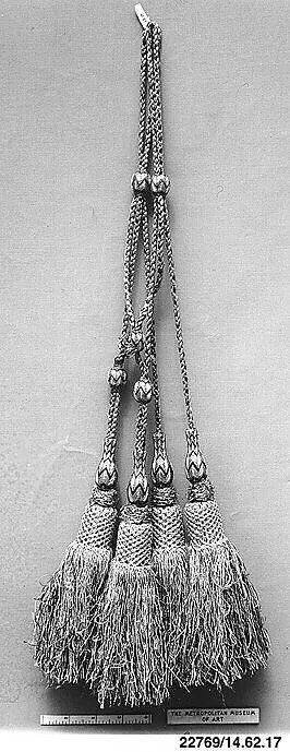 Two pairs of tassels — Unknown