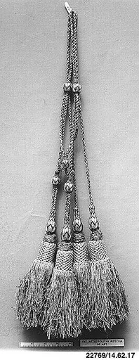 Two pairs of tassels