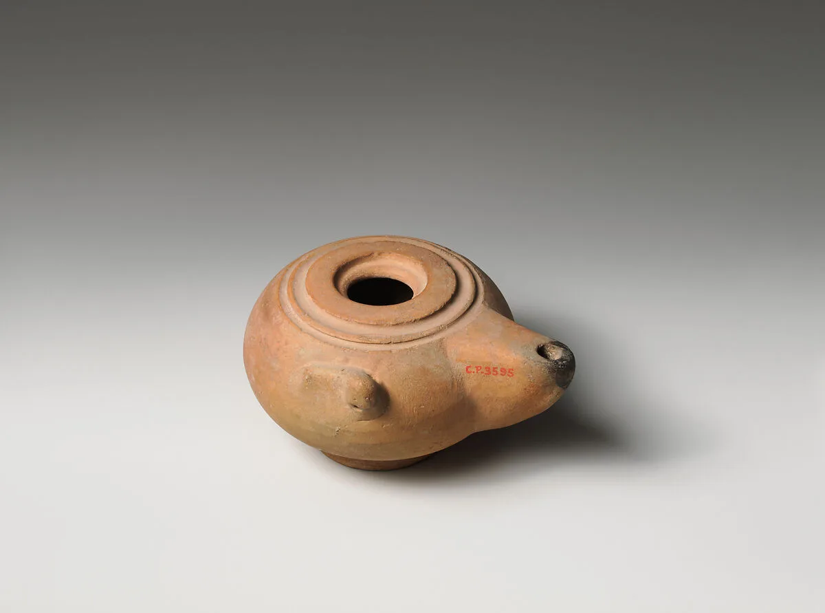 Terracotta oil lamp — Unknown