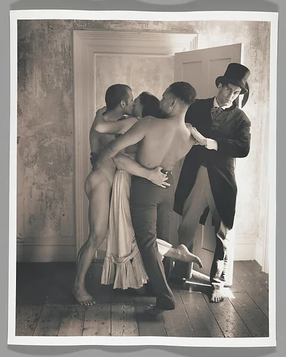 [Group of Three Men and One Woman in Open Doorway]