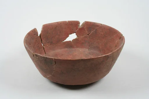 Undecorated painted bowl with straight sides