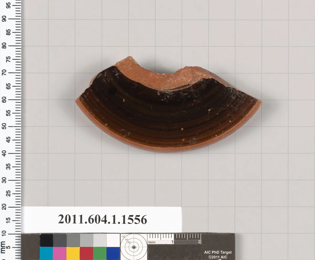 Terracotta fragment of a kylix (drinking cup) — Pithos Painter