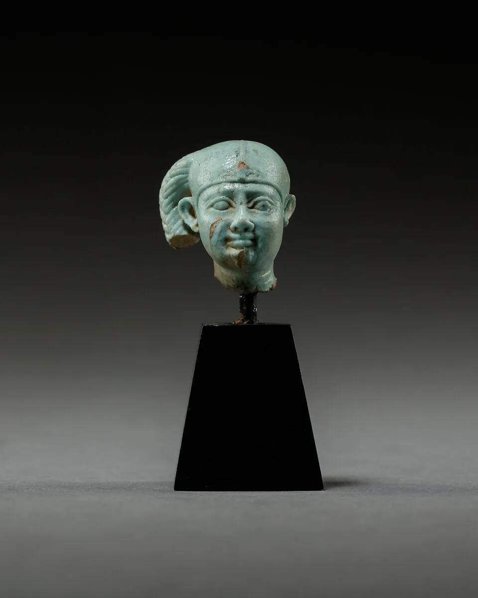 Head from a figure of a child god, perhaps Harpokrates — Unknown