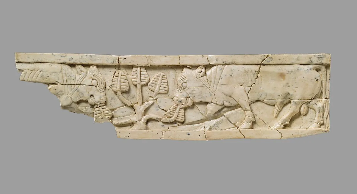 Furniture plaque carved in relief with bulls and tree — Unknown