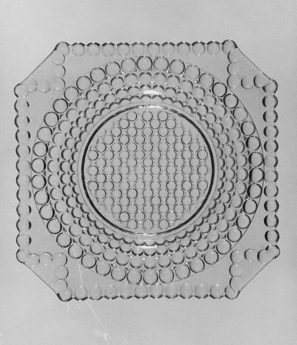 Plate — Adams and Company
