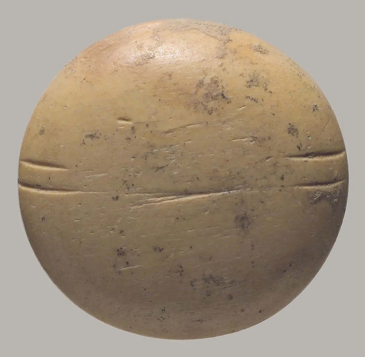 Disc: die or gaming piece (?) — Unknown