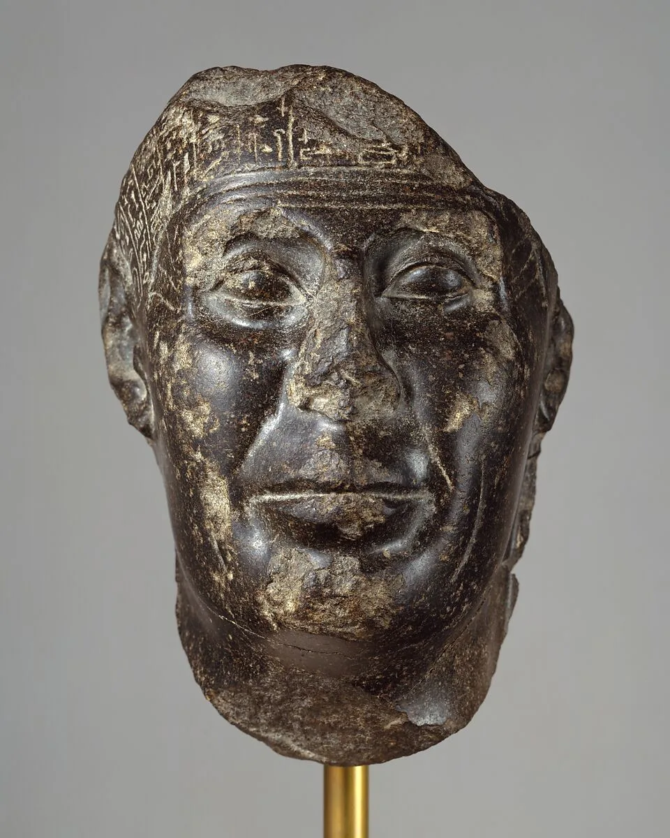 Head from a Statue with Magical Texts — Unknown