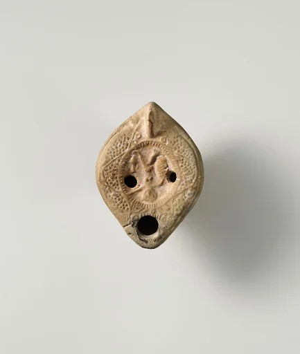 Terracotta oil lamp