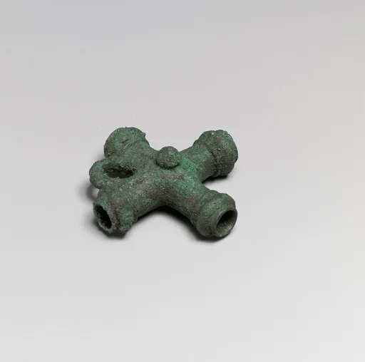 Fragments of a cart or chariot, crossed cylinders