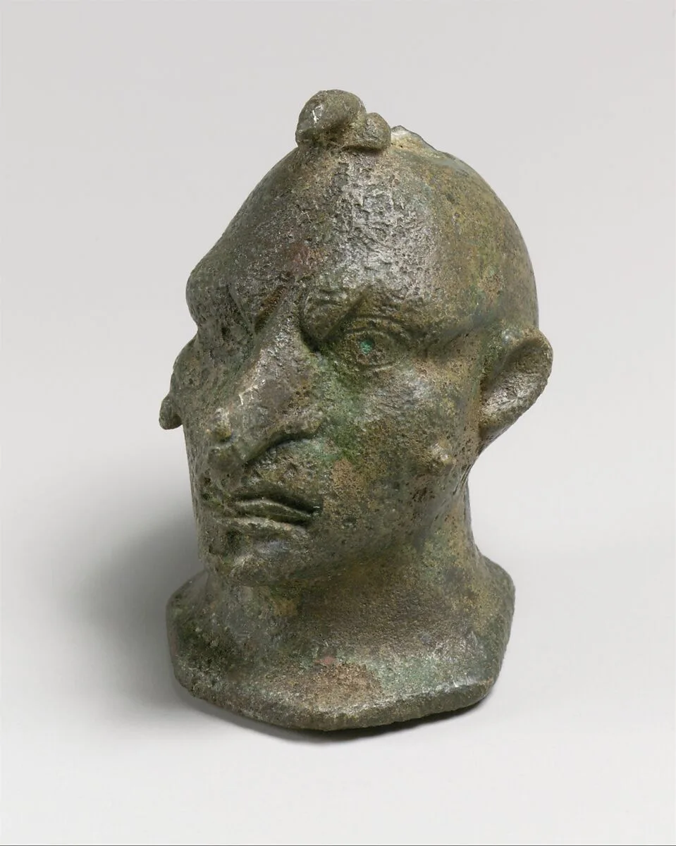 Bronze head of a grotesque — Unknown