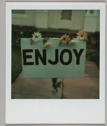 [Wooden Sign Lettering: "ENJOY"]