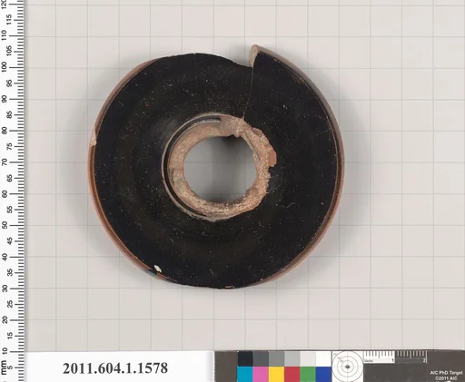 Terracotta fragment of a kylix (drinking cup)
