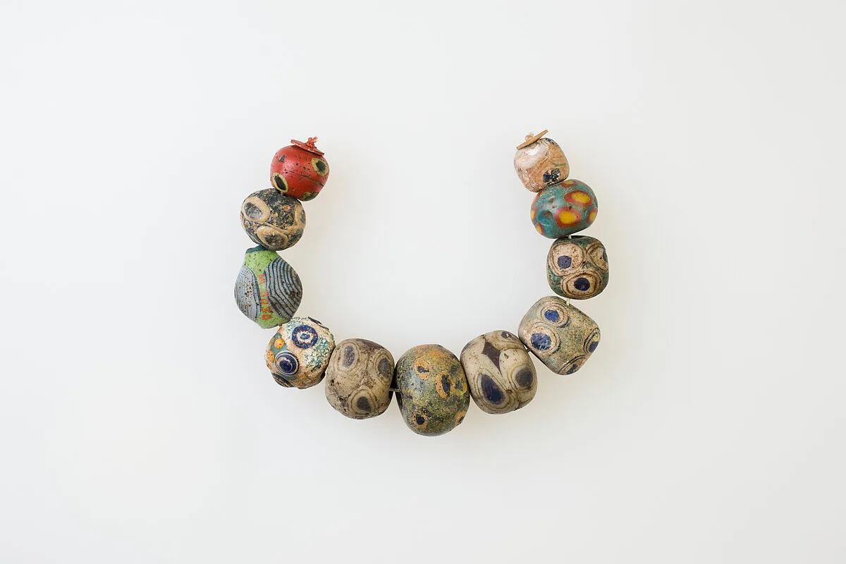 String of 11 Eye Beads — Unknown