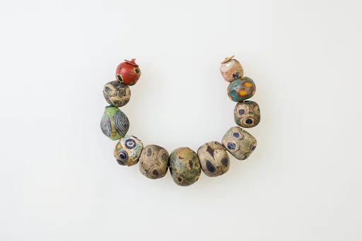 String of 11 Eye Beads