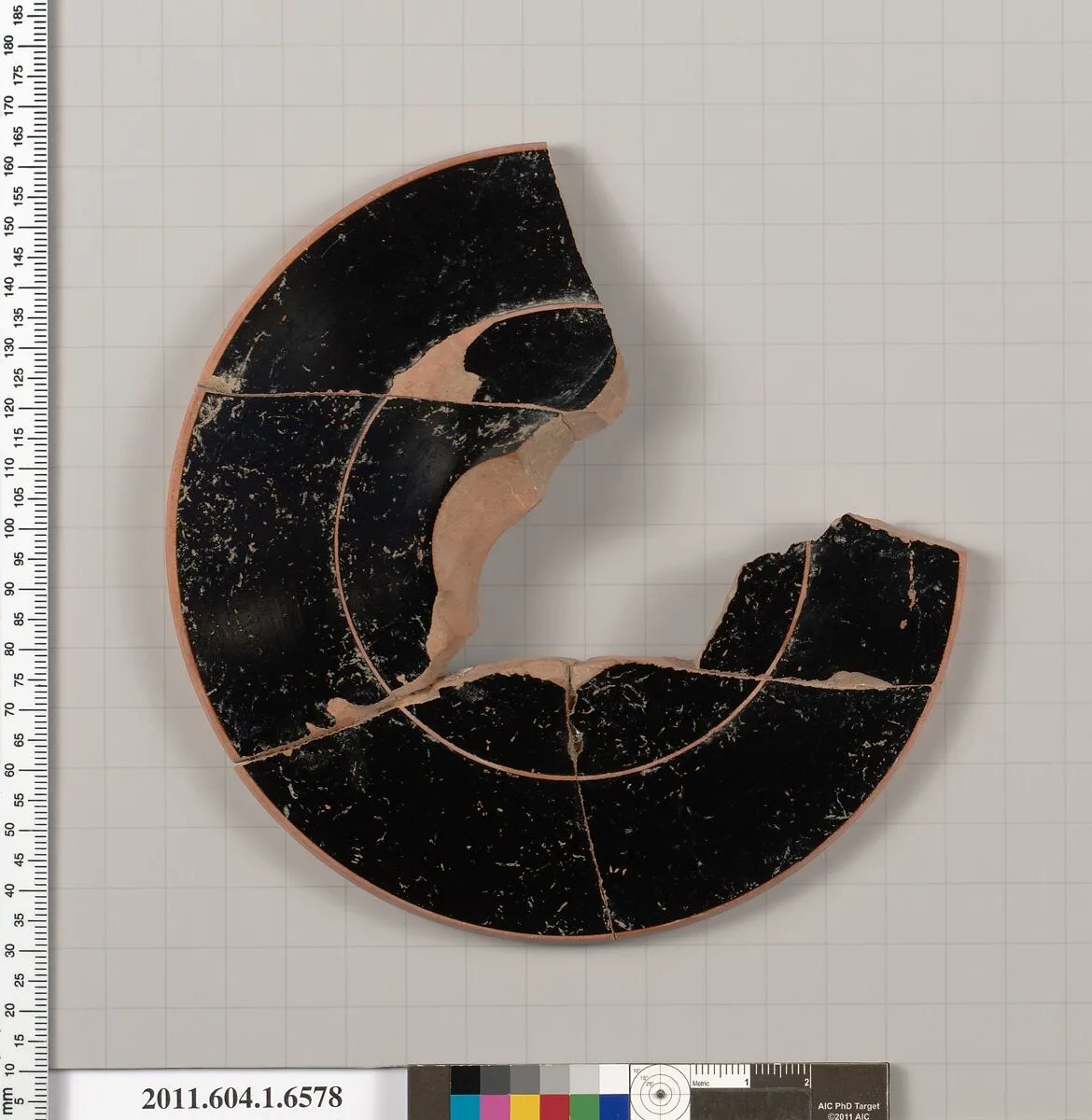 Terracotta fragment of a kylix (drinking cup) — Colmar Painter