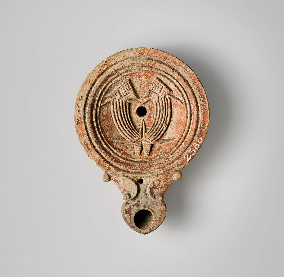 Terracotta oil lamp — Unknown