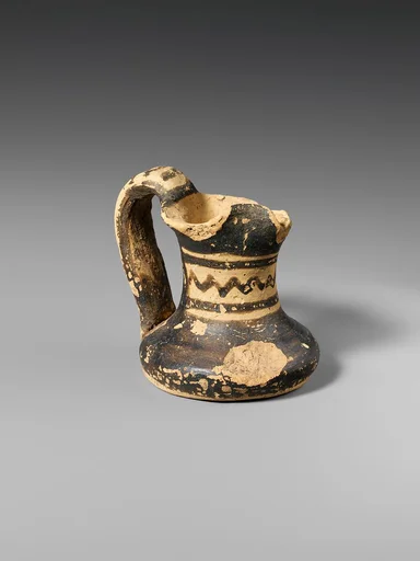 Miniature terracotta jug