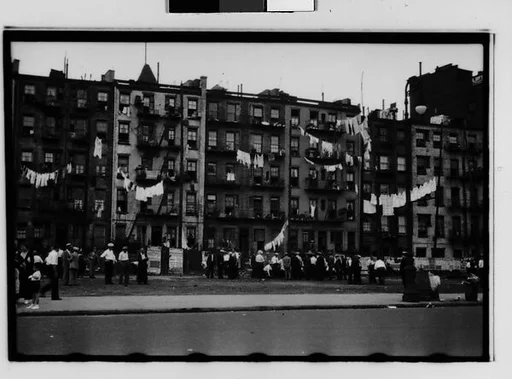 [Two 35mm Film Frames: Crowd in Front of Tenement Buildings, New York City]
