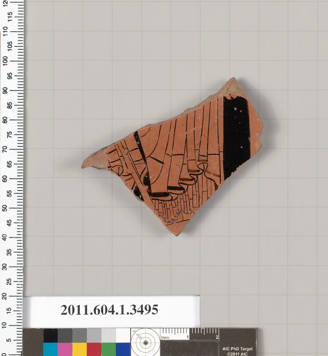 Terracotta fragment of a kylix (drinking cup) — Makron