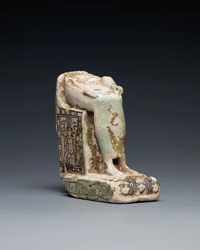 Lower half of a goddess on a throne with Bes figures, its base formed by prostrate captives