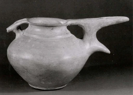 Bridge-spouted pitcher