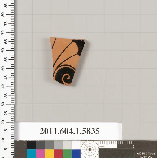 Terracotta fragment of a kylix: eye-cup (drinking cup)