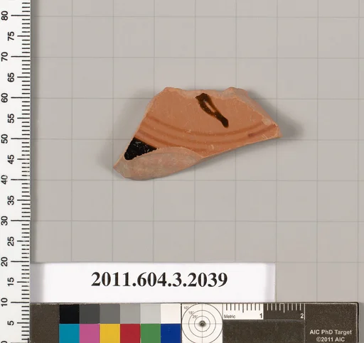 Terracotta fragment of a kylix (drinking cup)