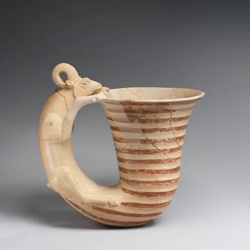 Vessel with a handle in the form of a ram