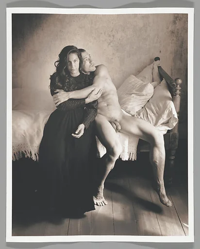 [Male Nude Clutching Woman on Bed]