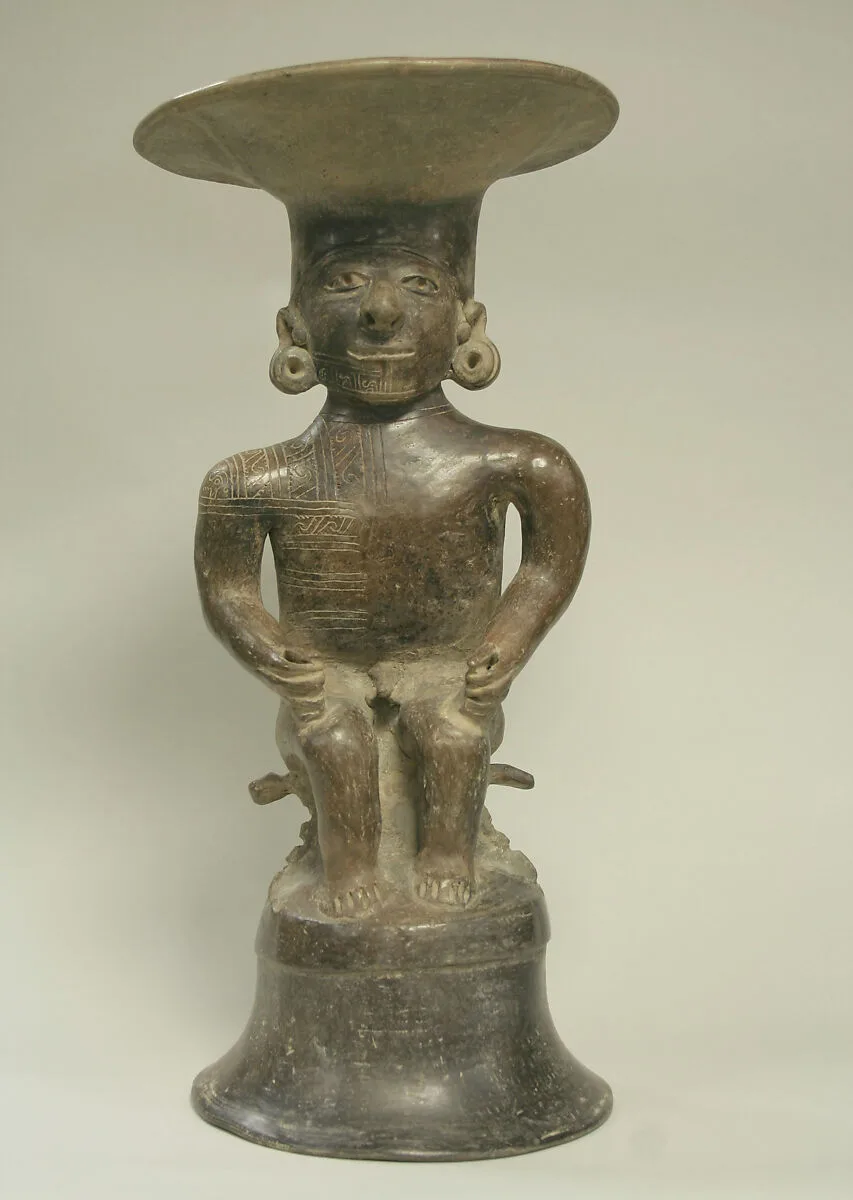 Ceramic Seated Male with Headdress — Unknown