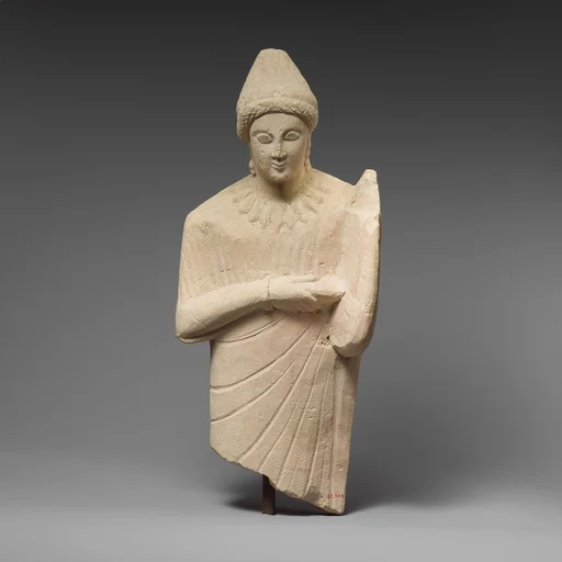 Limestone statuette of a female lyre player