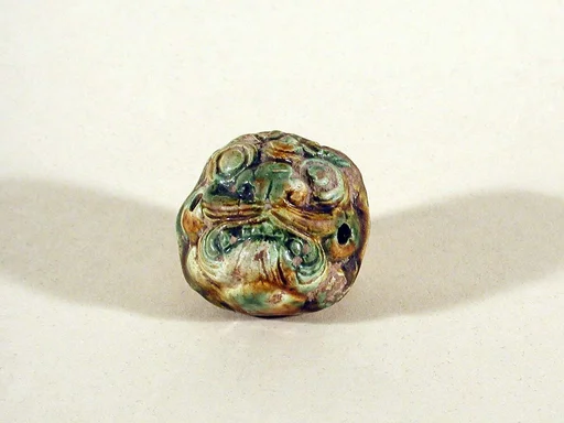 唐  三彩陶珠|Ornament with mask motif