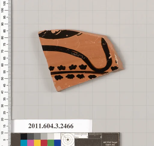 Terracotta fragment of a kylix: eye-cup (drinking cup)