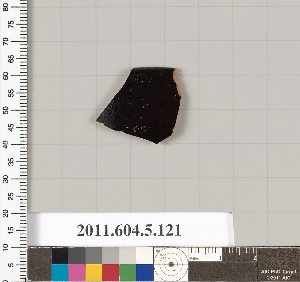 Terracotta rim fragment of a stemless kylix (drinking cup)? — Unknown